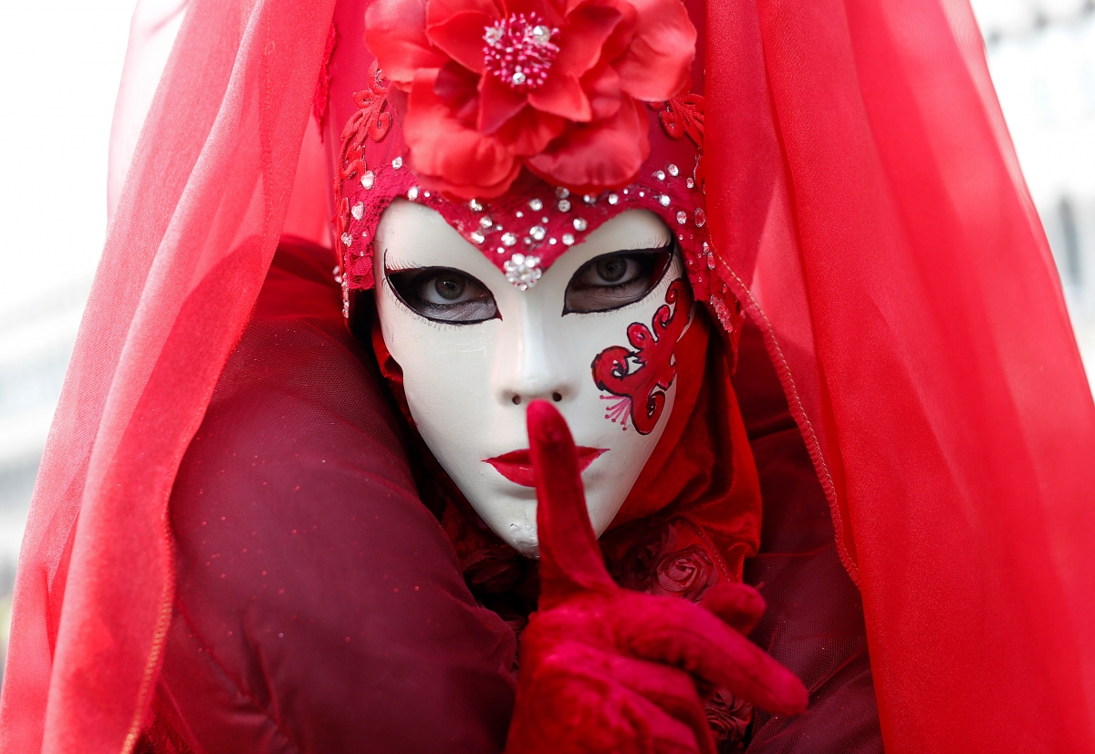 Thousands of revellers participate in masquerade parade at Venice