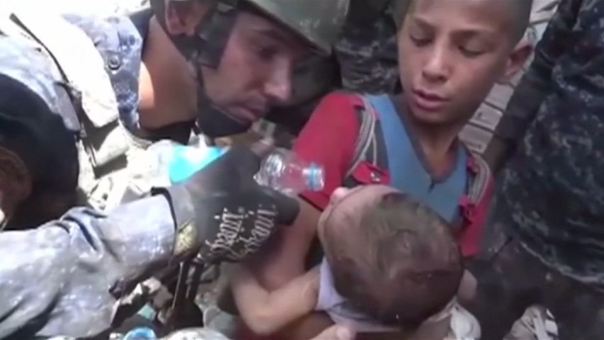 Iraqi forces free children trapped under rubble in Mosuls Old City