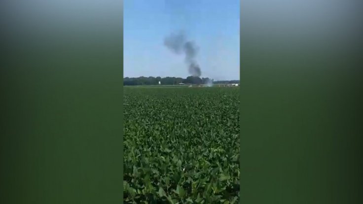 Video shows aftermath of fatal mid-air military plane explosion and crash