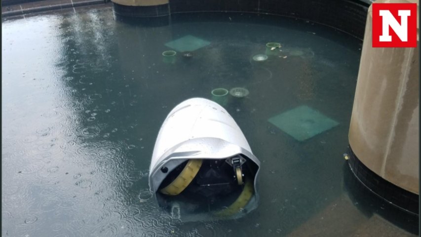 Security robot falls into a fountain in Washington DC