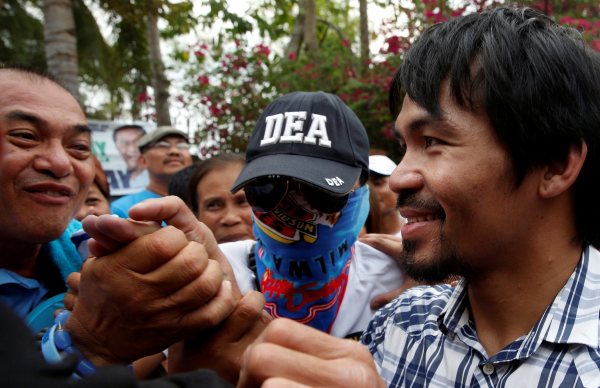 Manny Pacquiao kidnap threat: Police arrest suspects as boxing star continues Senate campaign