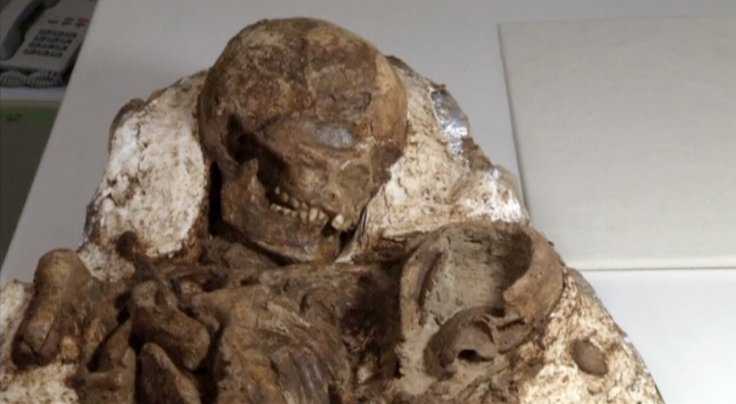 ,800-year-old remains of mother cradling her baby found in Taiwan ,800-year-old remains of mother cradling her baby found in Taiwan