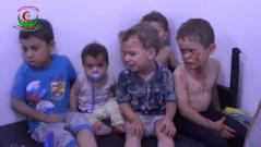 Wounded children treated after air strikes defy ceasefire in Syria