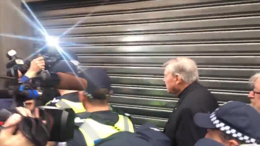 Cardinal George Pell navigates media scrum during court appearance