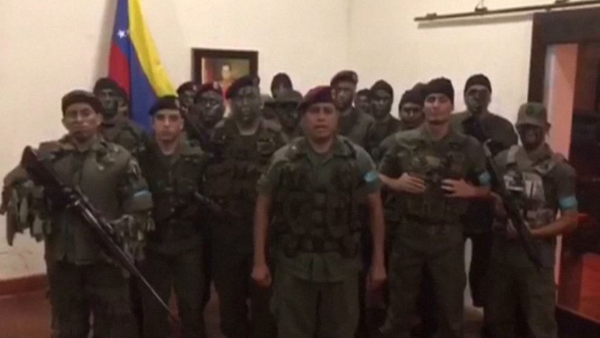 Reports of attack on Venezuelan military fort as armed men call for uprising
