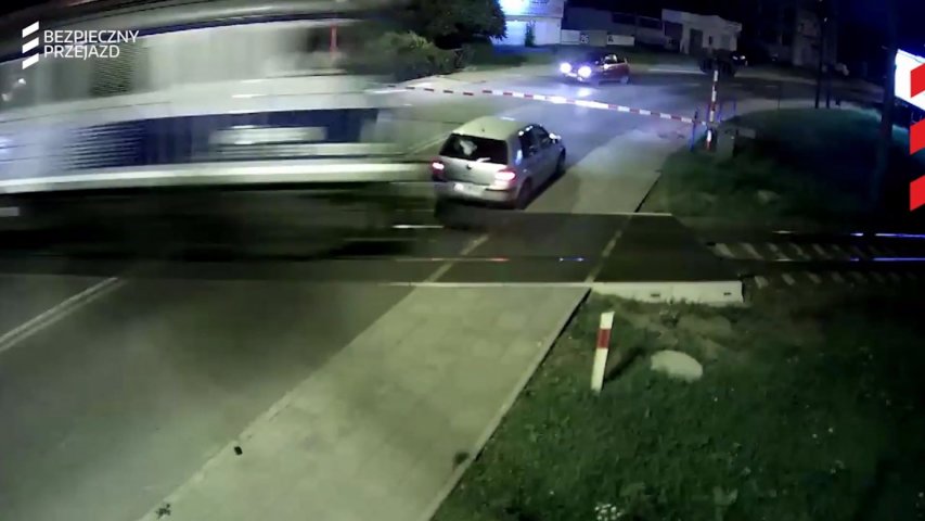 Car narrowly avoids deadly collision with train in Poland