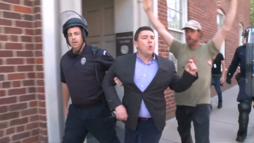 Unite the Right organiser chased away by angry crowds in Charlottesville