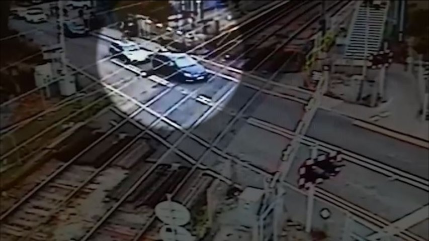 Watch panicky learner driver make destructive mistake at level crossing in Essex