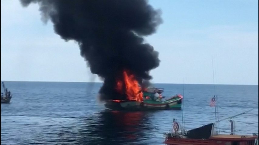 Malaysia sets boat ablaze as it turns up heat on illegal fishing