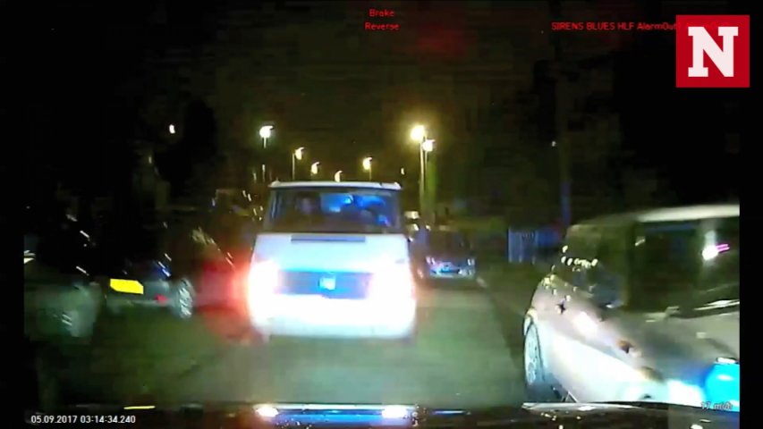 White van purposely drives head on into police car during high speed chase