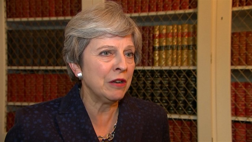 UK PM Theresa May defends response to Hurricane Irma