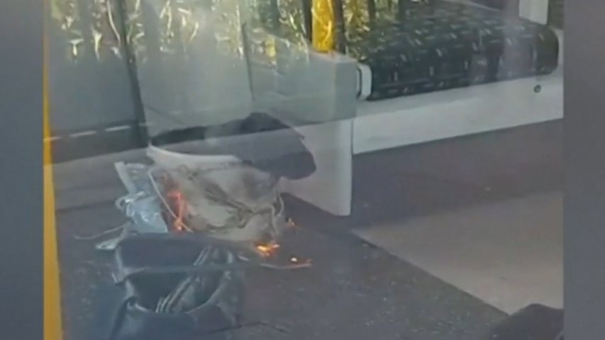 Video shows suspected bomb burning on London tube train