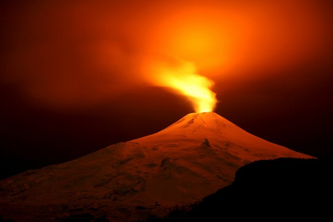 The Villarrica Volcano is seen at night from Pucon town