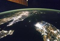 Undated NASA handout picture of North Korea (the dark area) and South Korea