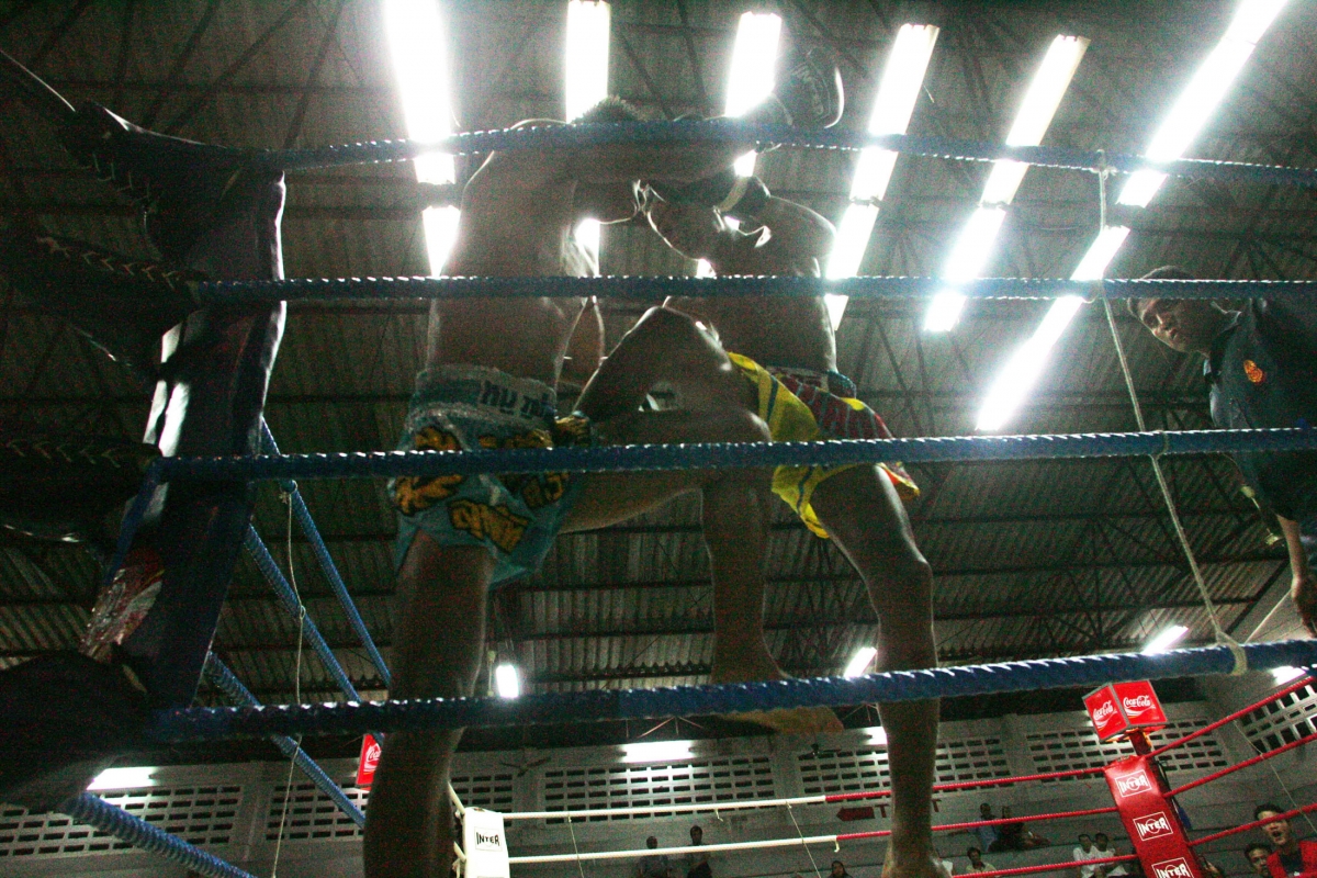 Thai "muay Thai" boxers kick each other during fight in Thailand's Phuket.