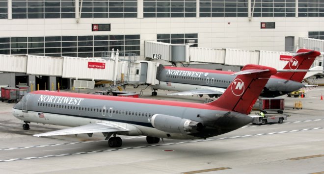 Northwest Airlines aircraft taxies into gate at Detroit Metropolitan Airport Northwest Airlines aircraft taxies into gate at Detroit Metropolitan Airport