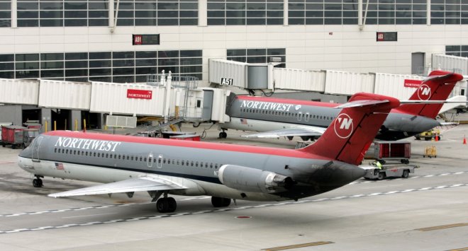 Northwest Airlines aircraft taxies into gate at Detroit Metropolitan Airport