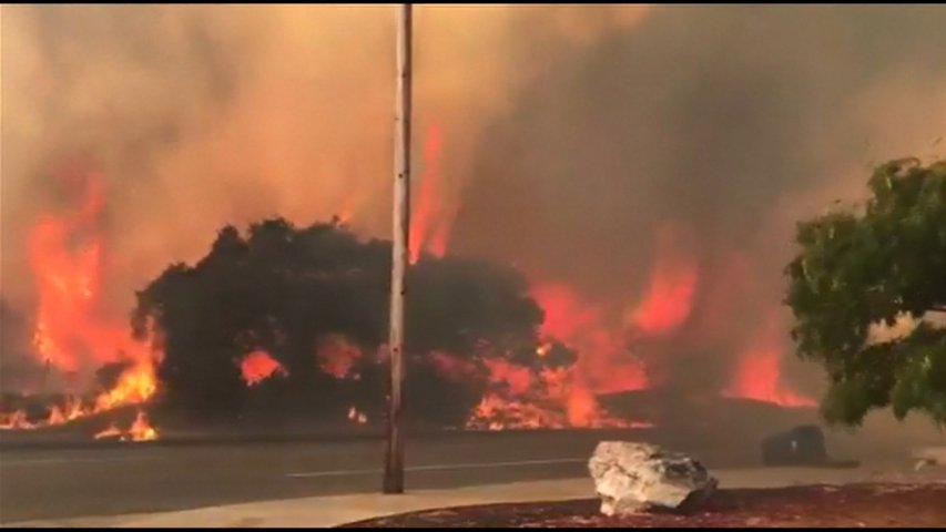California wildfire comes dangerously close to homes