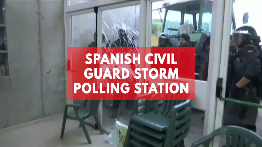 Spains Civil Guard storms polling station