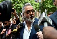 Force India co-owner, Vijay Mallya, talks outside Westminster Magistrates, in central London Force India co-owner, Vijay Mallya, talks outside Westminster Magistrates, in central London