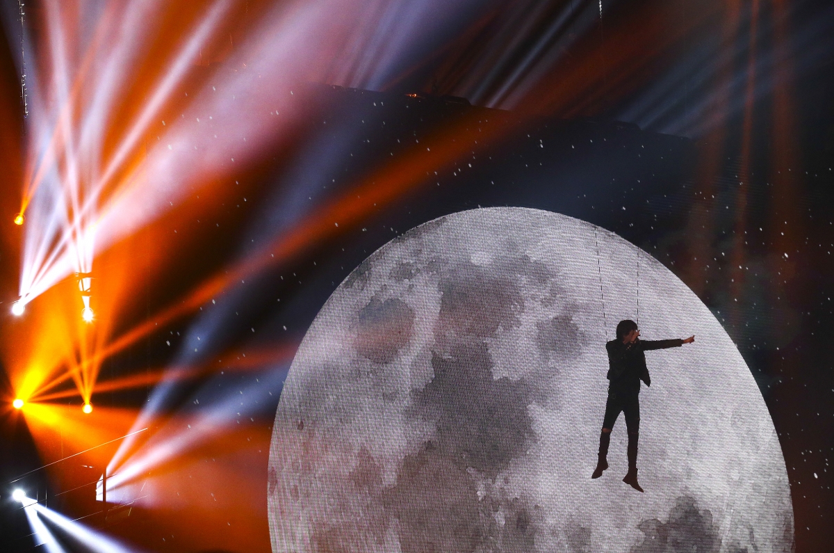 An artist performs during the MTV EMA awards 2015 at the Assago forum in Milan