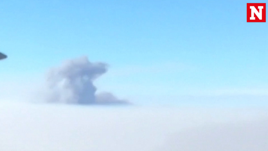 California wildfire: Mid-flight video captures smoke and haze rising through clouds