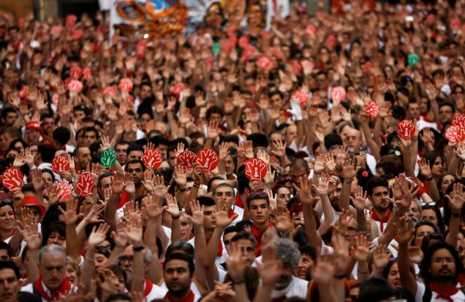 People take part in a protest against sexual violence against women during the San Fermin festival in Pamplona, northern Spain, July 7, 2016. REUTERS/Susana Vera