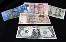 Asian currencies drop on Yellen comments