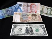 Asian currencies drop on Yellen comments