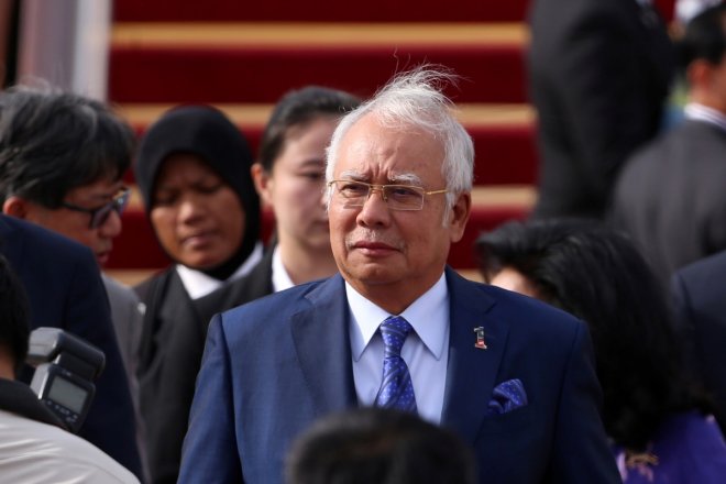 Malaysian Prime Minister Najib Razak arrives at the Beijing Capital International Aiport