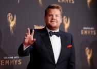 Actor James Corden poses at the 2017 Creative Arts Emmy Awards in Los Angeles, California