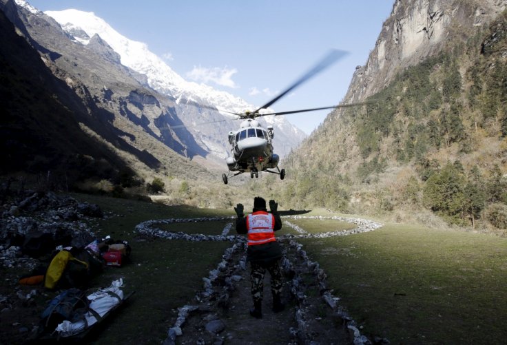A helicopter arrives at a trekkers camp to evacuate Israeli solders after a mission to rescue climbers affected by last week's earthquake from the Himalaya mountains near Dhunche, Nepal, May 3, 2015. REUTERS/Olivia Harris