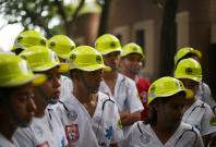 Students of the Francisco Menendez National Institute prepare to participate in a national earthquake...