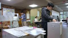 Japanese voters head to the polls as Typhoon Lan batters the country