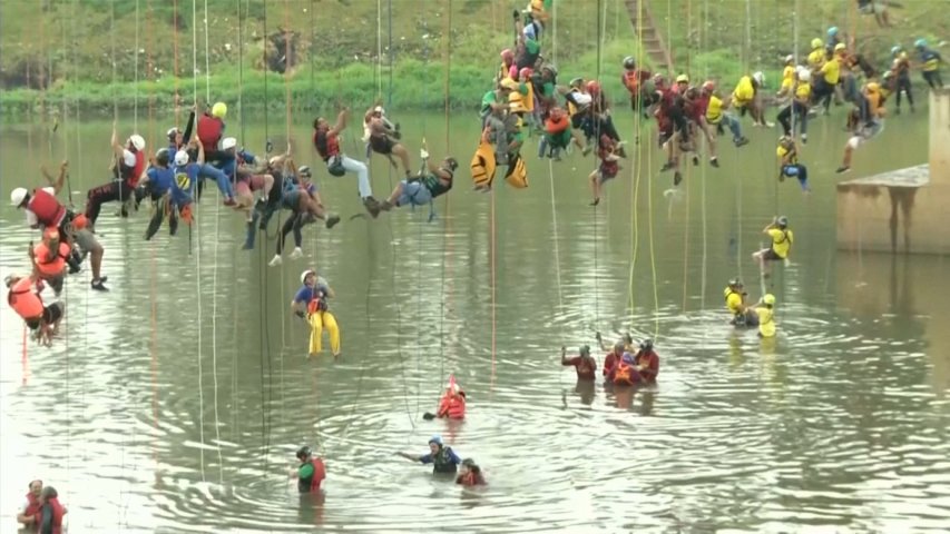 Watch: 245 Thrill-seekers jump off a bridge in Brazil for world record