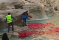 Romes Trevi Fountain runs red after man pours dye in water