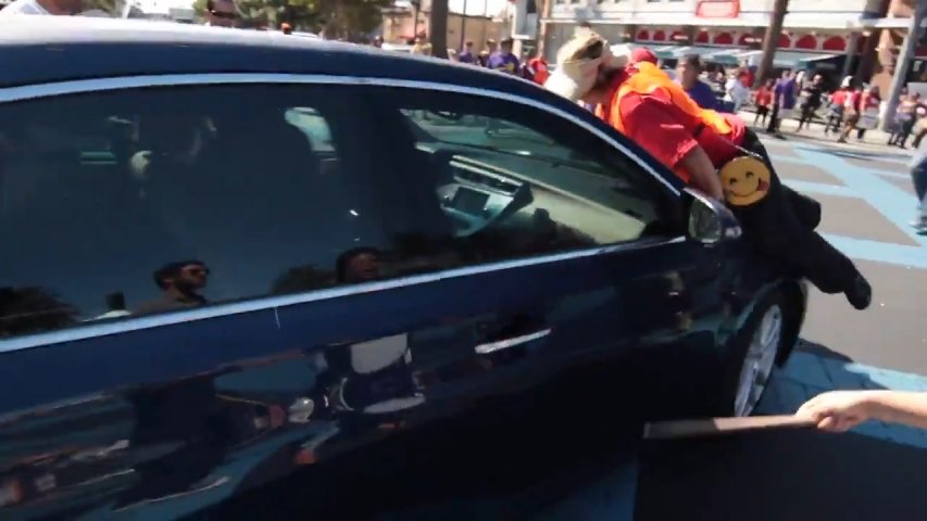 Dramatic footage shows man driving through protesters outside California Congressmans office