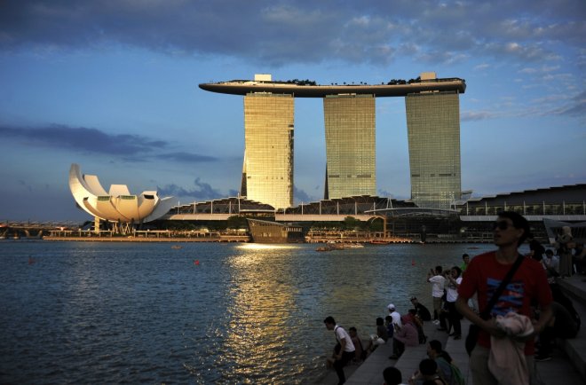 waterfront as sunlight shines on the Marina Bay Sands