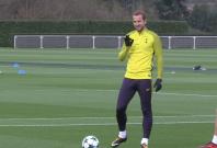 Harry Kane gives OK sign in training before Tottenham face Real Madrid