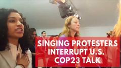 Watch the moment singing protesters interrupt U.S. panel at COP23