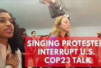 Watch the moment singing protesters interrupt U.S. panel at COP23