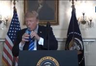 President Trump drinks water during Asia trip recap