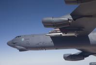 A U.S. Air Force B-52 carries the X-51 Hypersonic Vehicle out to the range for a launch test