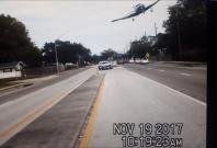 Dashcam footage shows small plane clipping a tree and crashing onto a Florida highway