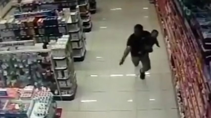 Off-duty cop in deadly shoot-out whilst holding infant son