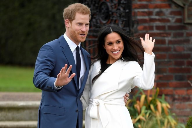 Britain's Prince Harry poses with Meghan Markle in the Sunken Garden of Kensington Palace, London, Britain,