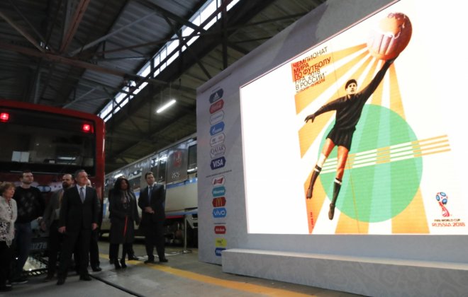 Participants, including FIFA Secretary General Fatma Samoura and Russian Deputy Prime Minister Vitaly Mutko, attend a ceremony unveiling the Official Poster for the 2018 FIFA World Cup Russia