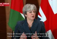 British Prime Minister Theresa May says Donald Trump was wrong to retweet far-right video