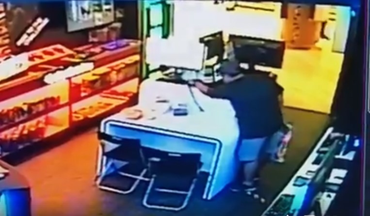 man caught stealing laptop