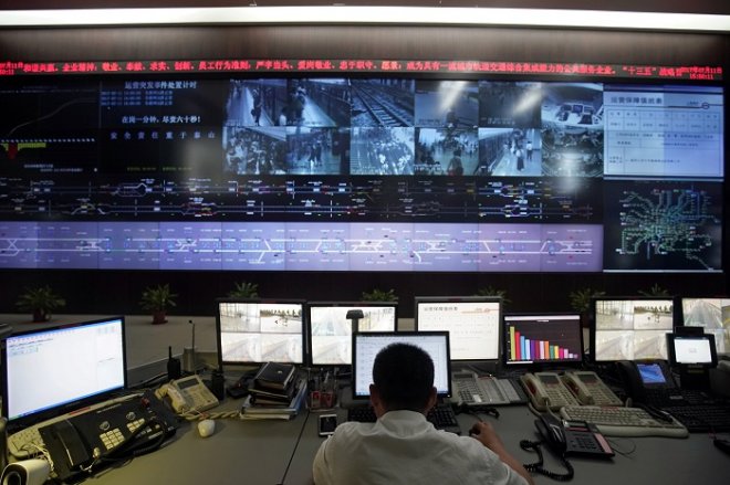 An employee works at Shanghai Shentong Metro Group's comprehensive operation coordination center in Shanghai